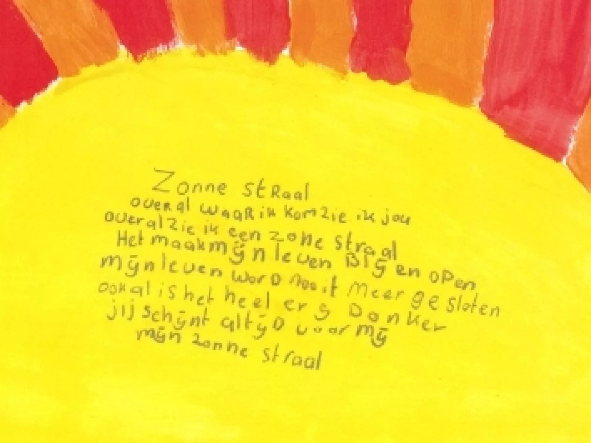Geverfde zon met gedicht erop geschreven